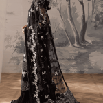 Black and White Saree back view with striped sequin blouse