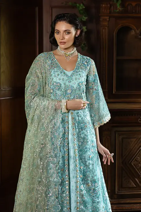 Model wearing Mushq Endless Love Aqua Blue designer dress – Salai Karai USA