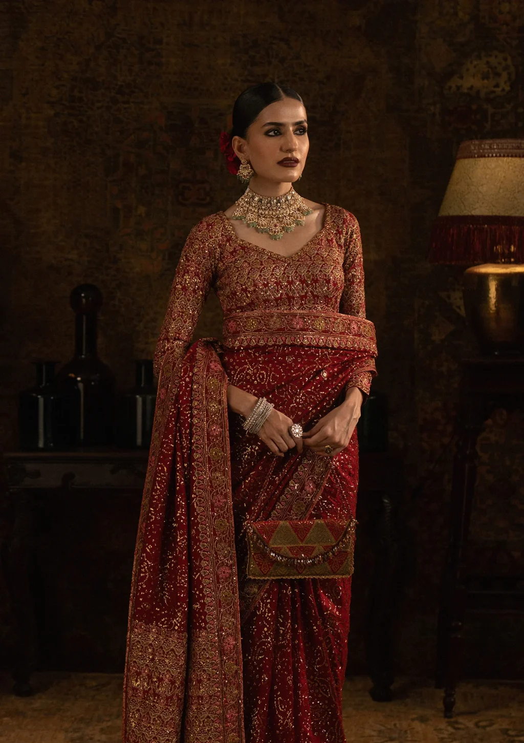 Luxury Maroon Velvet Embroidered Saree blouse close-up with zari and resham embroidery
