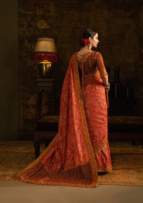 Orange and Maroon Wedding Saree back view with embroidered silk blouse