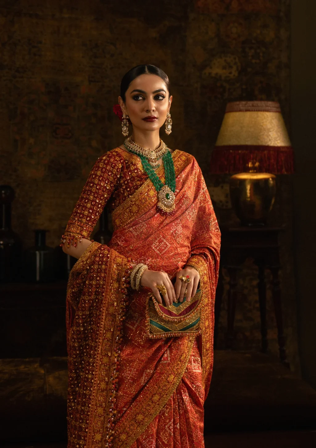 Orange and Maroon Wedding Saree close-up view with intricate embroidery and organza detailing