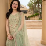 Close-up of Faiza Saqlain Eldira embroidered neckline